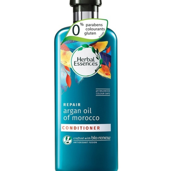 شامپو نرم کننده موی روغن آرگان مراکشی هربال اسنس Herbal Essences - دارای pH متعادلدارای فرمول گیاهیحاوی جلبک دریایی کلپبدون رنگ، پارابن و گلوتنترمیم کننده موهای آسیب دیدهصاف کننده موهای نامنظم و درهمرایحه دلپذیر مرکبات، ادویه جات و وانیلحاوی آنتی اکسیدان جهت محافظت موهاحاوی آب آلوئه ورا جهت رطوبت رسانی و تغذیه موحاوی بیش از 90 درصد عصاره های برگرفته از طبیعتحاوی رو ...